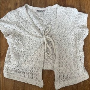 this is a crochet top made from a very small business.